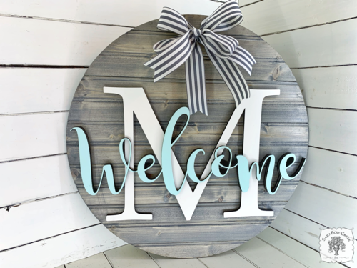 20" Round Sign Customized with Initial and Overlapping "Welcome"